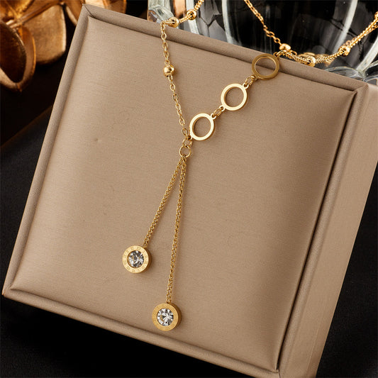 Fashionable, simple, light luxury, versatile, long tassel with diamond inlaid circle pendant, titanium steel irregular necklace