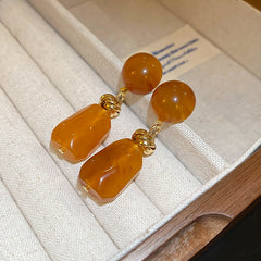 Round irregular resin earrings with simple retro design, niche fashion, light luxury earrings