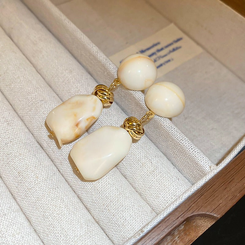 Round irregular resin earrings with simple retro design, niche fashion, light luxury earrings