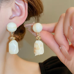 Round irregular resin earrings with simple retro design, niche fashion, light luxury earrings