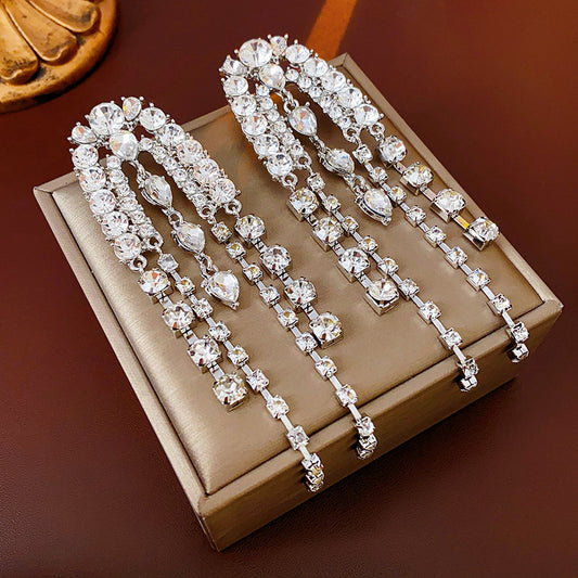 Water droplet shaped personalized design tassel earrings European and American fashion earrings high-end feeling light luxury earrings